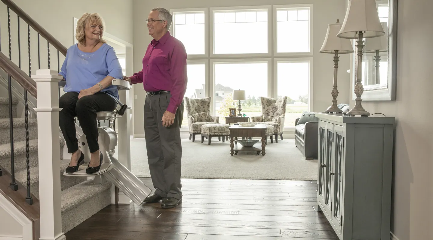 Bruno Elan stairlift on a straight staircase in a family home