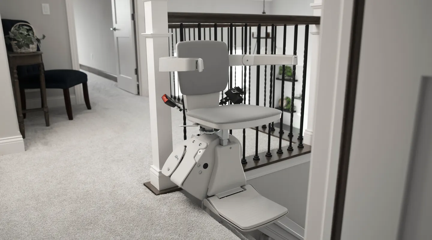 Bruno Elan stairlift at the top of the stairs