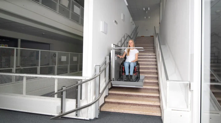 Ascendor wheelchair platform stairlift on the stairs of a public building