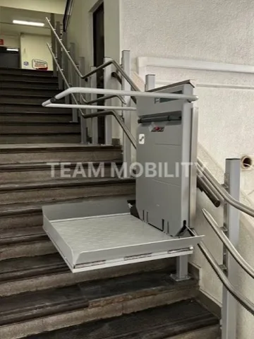 Wheelchair platform stairlift on a staircase