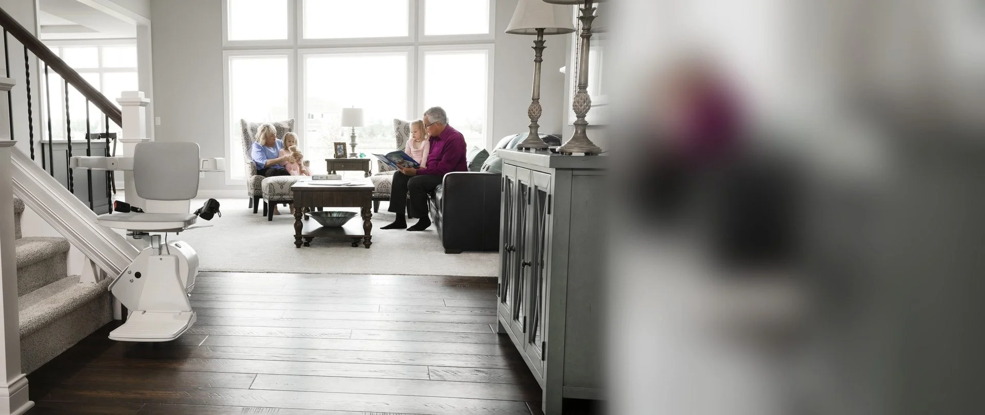 Stairlift at the foot of the stairs in a family home